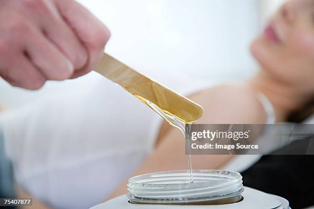 hot wax treatment - wax stock pictures, royalty-free photos & images