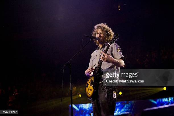 Guitarist and lead singer Chad Urmston of Dispatch performs on stage during the Dispatch: Zimbabwe benefit concert on July 13, 2007 at Madison Square...