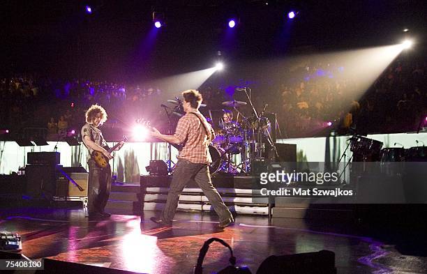 Dispatch performs on stage during the Dispatch: Zimbabwe benefit concert on July 13, 2007 at Madison Square Garden in New York City.