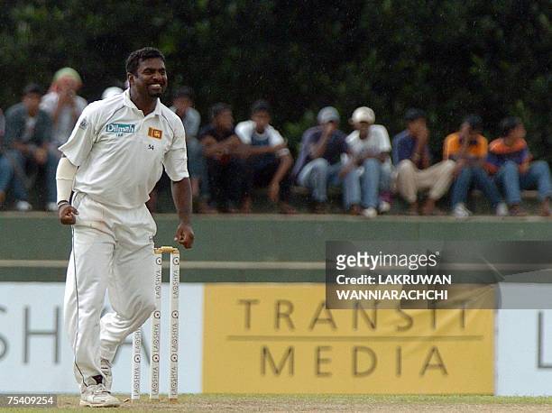 Sri Lankan cricketer Muttiah Muralitharan celebrates after the dismissal of Bangladesh cricket captain Mohammad Ashraful during the fourth day's play...