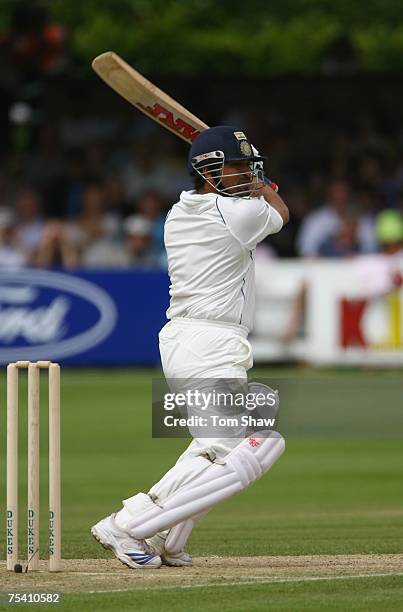 Sachin Tendulkar of India hits out during day 2 of the tour match between England Lions and India at the County Ground on July 14, 2007 in...