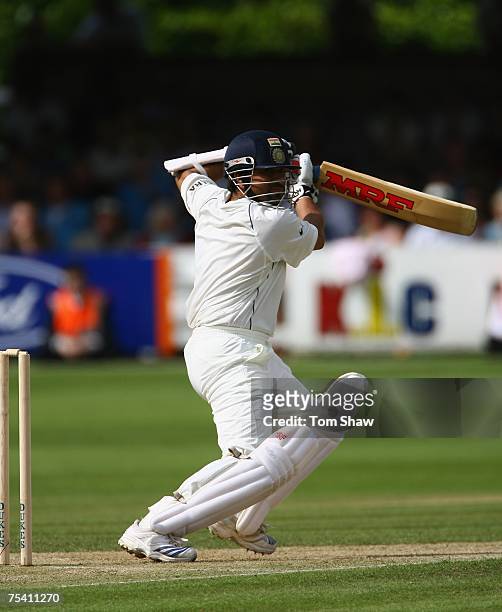 Sachin Tendulkar of India hits out during day 2 of the tour match between England Lions and India at the County Ground on July 14, 2007 in...