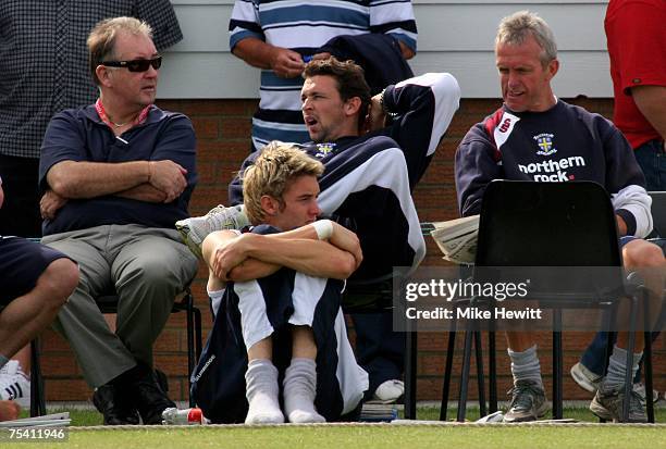 Steve Harmison of Durham sits out today's play during the Sussex v Durham LV County Championship match at Horsham cricket ground on July 14, 2007 in...