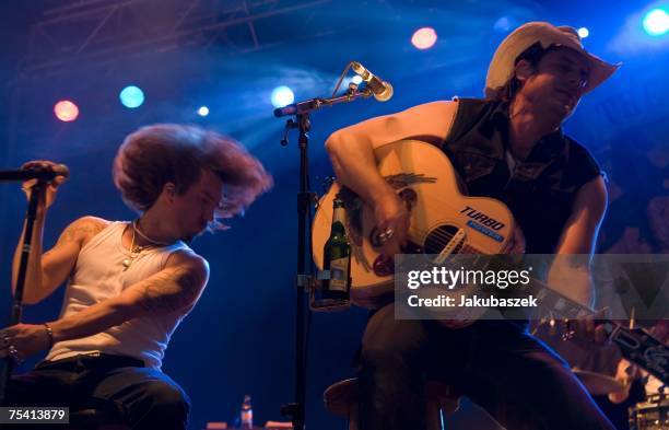 Alec "Boss Burns" Voelkel and Sascha "Hoss Powers" Vollmer of the German band The BossHoss perform during a concert at the Zitadelle Spandau July 14,...