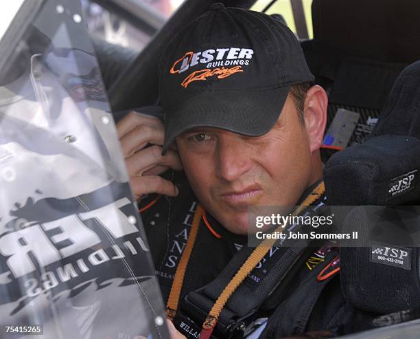 Tim Sauter driver of the Lester Buildings/ASI Limited Chevrolet truck prepares for his qualification for the Built Ford Tough 225 truck race at the...