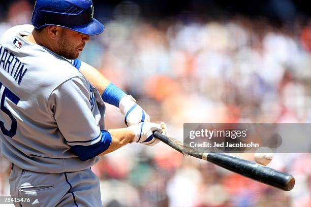 Russell Martin of the Los Angeles Dodgers breaks his bat in the fourth inning against the San Francisco Giants at AT&T Park July 14, 2007 in San...
