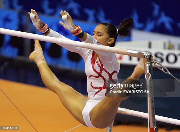 Rio de Janeiro, BRAZIL: Mexico's gymnast Maricela Cantu Mata executes her routine in the bars during the XV Pan American Games Rio 2007 in Rio de...