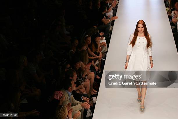 Barbara Meier, 'Germany's Next Top Model', walks the runway displaying an outfit by TalkingMeansTrouble at the Karstadt New Generation Award fashion...