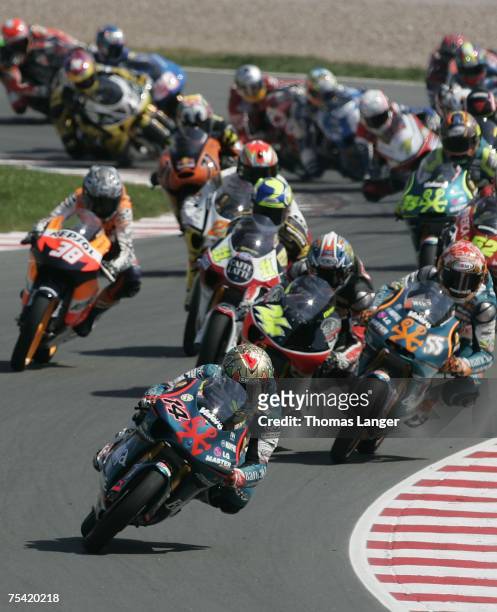 Gabor Talmacsi of Hungaria leads the field during the 125cc race in the German Moto Grand Prix at the Sachsenring Racetrack on July 15, 2007 near...