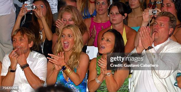 Stylist Ken Paves, Designer Jessica Simpson, Tina Simpson and Joe Simpson sit front row at the Jessica Simpson swimwear fashion show during "Mercedes...