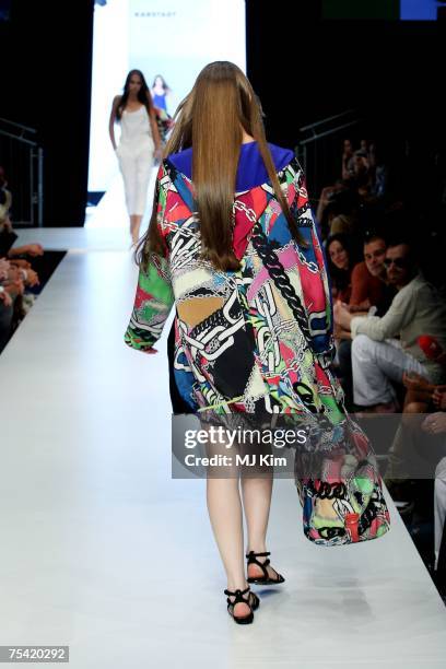 Model walks the runway displaying an outfit by Lala Berlin at the Karstadt New Generation Award fashion show during the Mercedes-Benz Fashion Week...