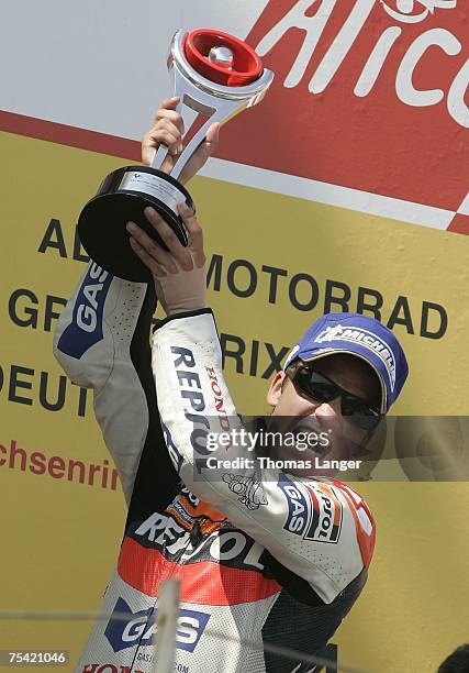 Dani Pedrosa from Spain celebrates his victory after the German Moto Grand Prix at the Sachsenring Racetrack on July 15, 2007 near Chemnitz, Germany.