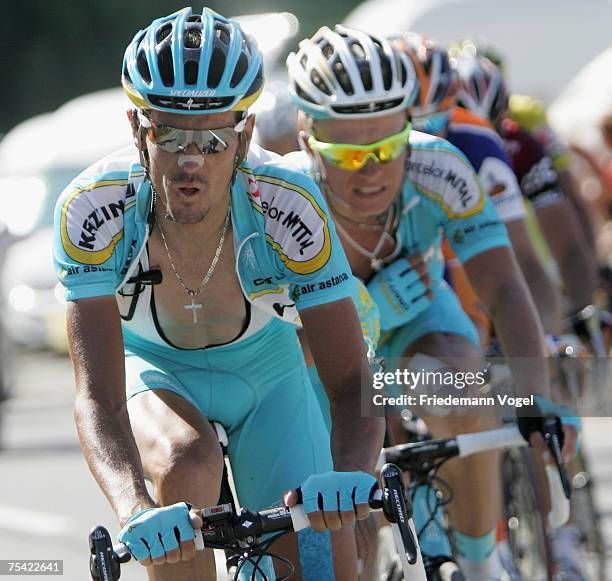 Alexander Vinokourov of Kazakhstan and Andreas Kloeden of Germany and Team Astana rides during stage eight of the Tour de France from Le...