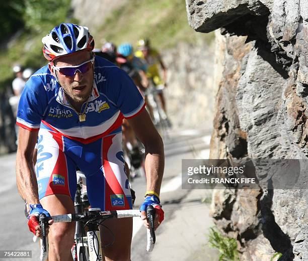 France?s Christophe Moreau rides uphill during the eighth stage of the 94th Tour de France cycling race between Le-Grand Bornand and Tignes, 15 July...