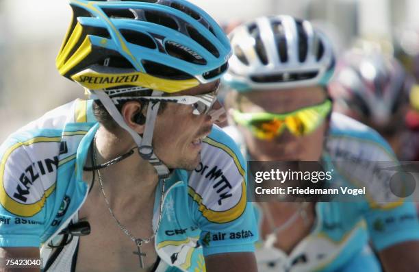 Alexander Vinokourov of Kazakhstan and Andreas Kloeden of Germany and Team Astana rides during stage eight of the Tour de France from Le...