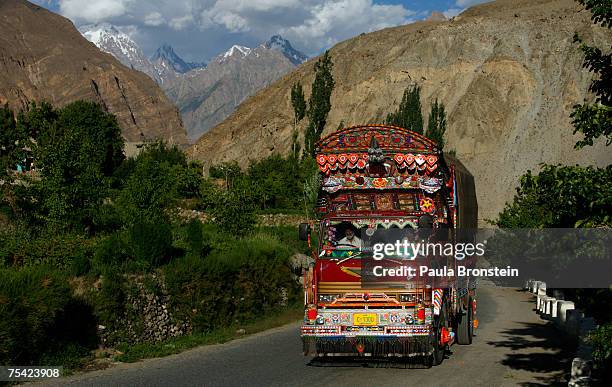 Fully decorated Pakistani truck makes it way along the Karakoram highway on July 11, 2007 in central Hunza valley, Pakistan. Pakistani truckers...