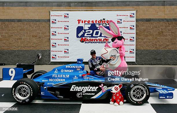 Scott Dixon, driver of the Target Chip Ganassi Racing Dallara Honda celebrates winning the IRL IndyCar Series Firestone Indy 200 on July 15, 2007 at...