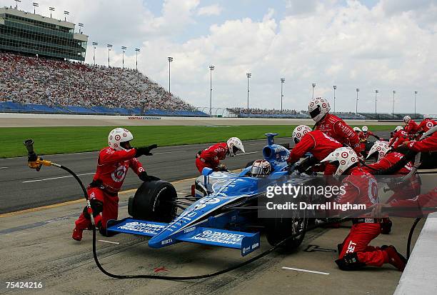 Scott Dixon, driver of the Target Chip Ganassi Racing Dallara Honda makes a pit stop during the IRL IndyCar Series Firestone Indy 200 on July 15,...