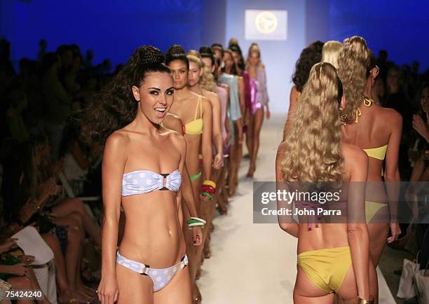 Model walks down the runway at the Shay Todd swimwear fashion show during "Mercedes Benz Fashion Week: Miami Swim" in the Cabana Grande tent at the...