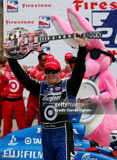 Scott Dixon, driver of the Target Chip Ganassi Racing Dallara Honda celebrates winning the IRL IndyCar Series Firestone Indy 200 July 15, 2007 at the...