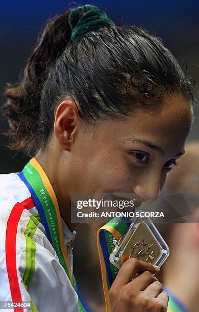 Rio de Janeiro, BRAZIL: Mexican Taekwon-Do fighter Iridia Salazar shows her gold medal during the award ceremony of the under 57Kg category, 15 July...