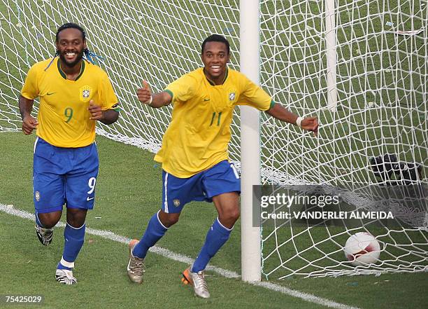 Brazil's Robinho and Vagner Love celebrates the second goal of their team against Argentina during the Copa America Venezuela-2007 final match 15...
