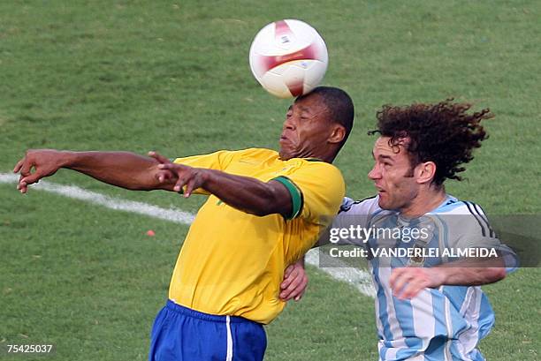 Argentine's player Gabriel Milito vies with Brazil's Julio Baptista during their Copa America Venezuela-2007 final match, 15 July, 2007 at the...