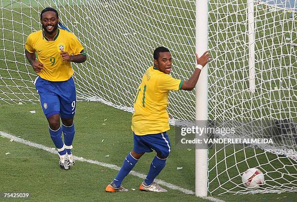 Brazil's Robinho and Vagner Love celebrate the second goal of their team against Argentina during the Copa America Venezuela-2007 final match 15...