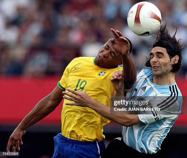 Argentine defender Roberto Ayala vies for the ball with Brazil's midfielder Julio Baptista during the final match of Copa America Venezuela-2007 at...