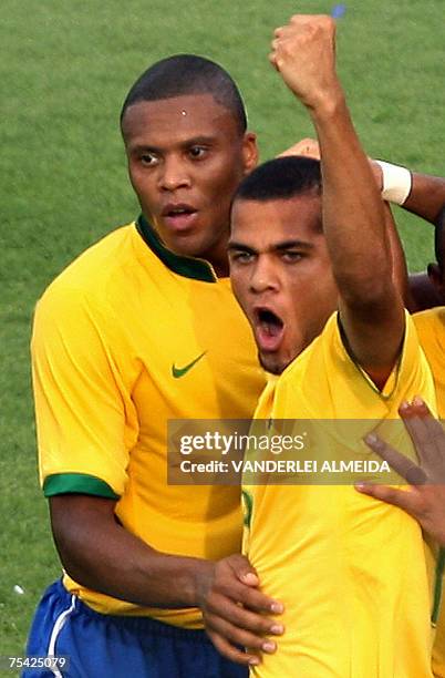 Brazil's Julio Baptista and Daniel Alves celebrates the second goal against Argentina during their Copa America Venezuela-2007 final match 15 July,...