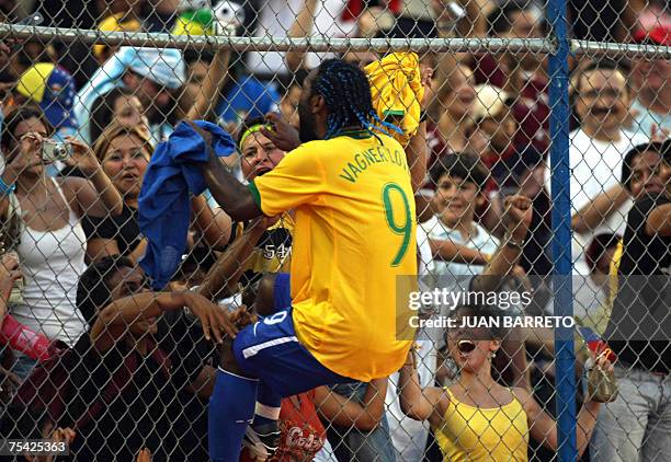 Brazilian forward Vagner Love celebrates the victory of his team against Argentina in the end of the Copa America Venezuela-2007 final match at the...