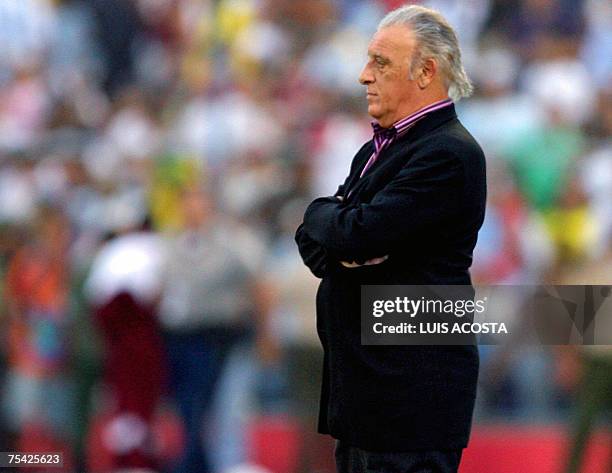 Argentine coach Alfio Basile shows his dejection at the end of the Copa America 2007 final match against Brazil at the Pachencho Romero stadium in...