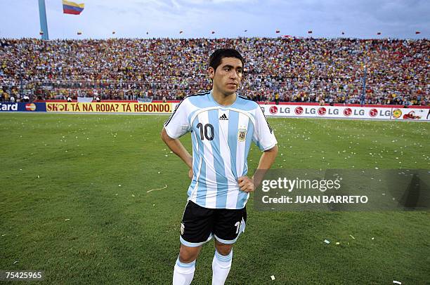 Argentina's football player Juan Roman Riquelme shows his dejection after his team was defeated 3-0 by Brazil in the final match of the Copa America...