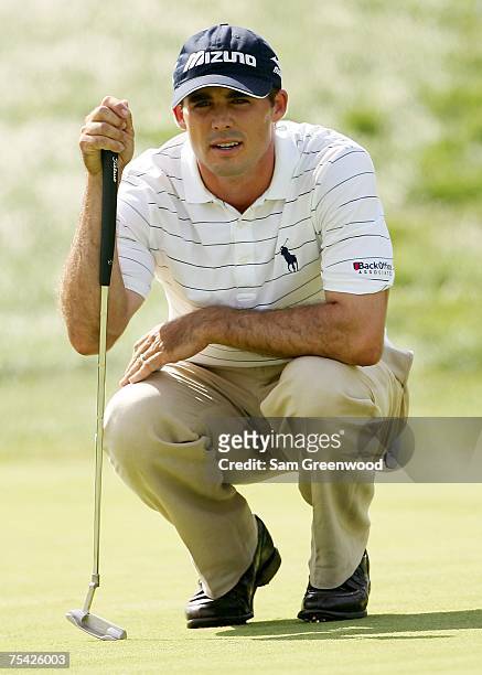 Jonathan Byrd lines up his birdie putt on the 17th hole during the final round of the John Deere Classic at the TPC Deere Run July 15, 2007 in...