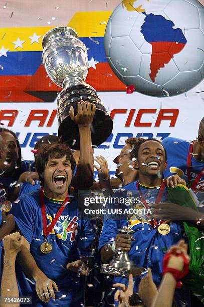 Brazil's players Robinho and Diego celebrate their victory against Argentina during the awarding ceremony of the Copa America Venezuela-2007 final...