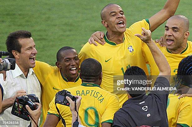 Brazil's coach Dunga celebrates with his players Mineiro , Julio Baptista, Alex Silva and Alex after beating Argentina in the final match of the Copa...