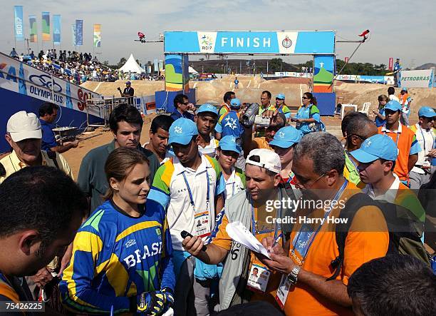 Ana Flavia of Brazil speaks to the media after her silver medal during the Cycling BMX Women's final in the 2007 XV Pan American Games at the Outeiro...