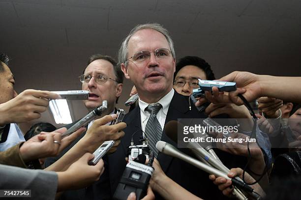 Christopher Hill, U.S. Envoy to the six-party talks, answers reporters' questions after meeting with South Korean Unification Minister Lee Jae-Joung...