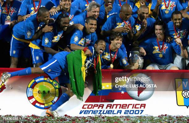 Brazilian football team celebrate their victory against Argentina during the awarding ceremony of the Copa America Venezuela-2007 final match at the...