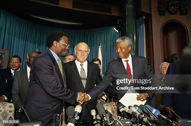 From left to right, Mangosuthu Gatsha Buthelezi of the IFP , incumbent South African President Frederik Willem de Klerk and Nelson Mandela of the ANC...
