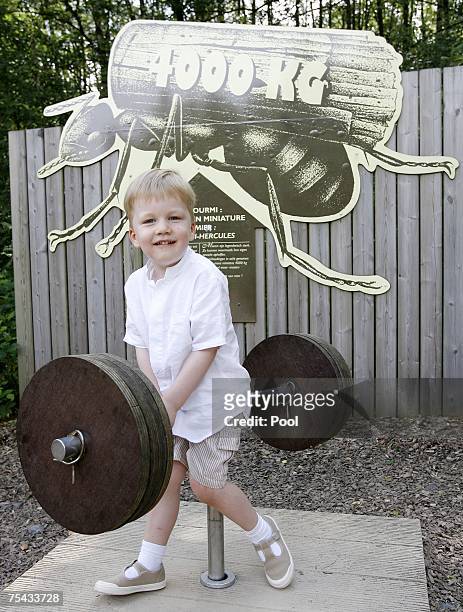 Prince Gabriel of Belgium plays during a walk in Park Chlrophylle on July 16 in Dochamps Belgium.