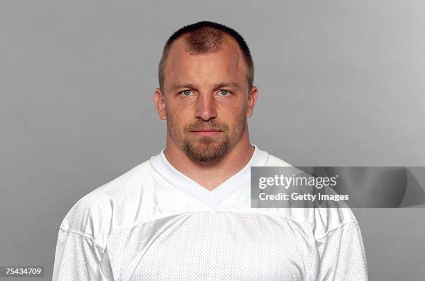 Cory Schlesinger of the Miami Dolphins poses for his 2007 NFL headshot at photo day in Miami, Florida.