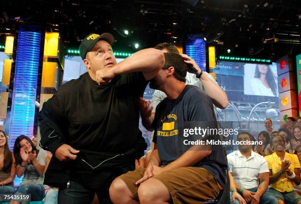 Actor Adam Sandler sniffs Actor Kevin James's armpit to see if he can differentiate between his and Jessicsa Biel's armpit, as MTV VJ Damien Fahey...
