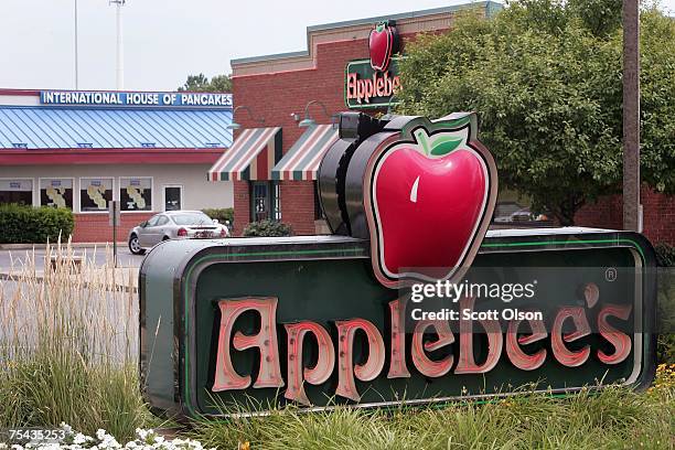 And Applebee's restaurants sit next door to each other July 16, 2007 in Elgin, Illinois. IHOP Corp. Has agreed to purchase Applebee's International...
