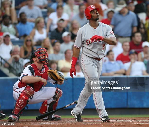 Ken Griffey, Jr. #3 of the Cincinnati Reds watches a second inning home run against the Atlanta Braves at Turner Field July 16, 2007 in Atlanta,...