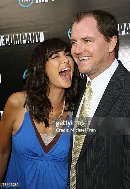 Actress Catherine Bell and Adam Beason arrives at the Los Angeles premiere of "The Company" at The Majestic Crest Theater on July 16, 2007 in...