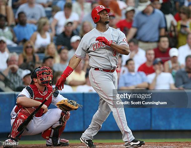 Ken Griffey, Jr. #3 of the Cincinnati Reds hits a second inning home run against the Atlanta Braves at Turner Field on July 16, 2007 in Atlanta,...
