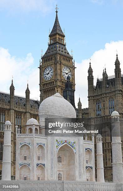 Replica of The Taj Mahal floats past Parliament on the River Thames on July 17, 2007 in London. The replica Taj is part of the India Now Festival,...