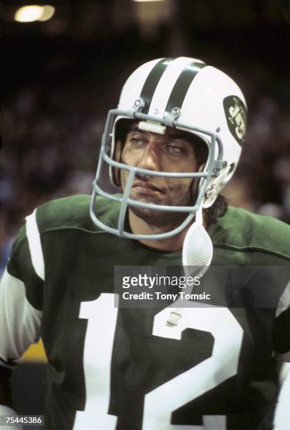 Quarterback Joe Namath of the New York Jets watches the action from the sidelines during a game on September 21, 1970 against the Cleveland Browns at...