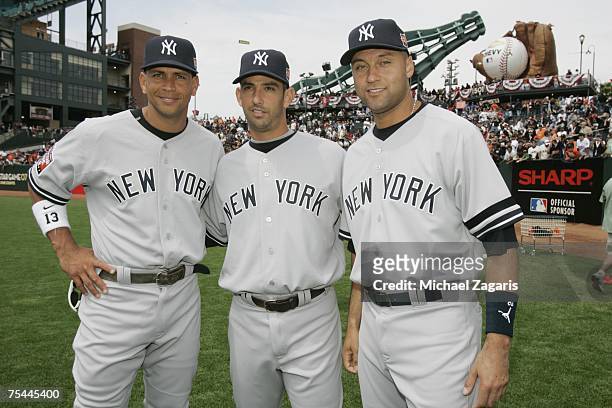 American League All-Stars, Alex Rodriguez, Jorge Posada, and Derek Jeter of the New York Yankees pose for a group photo before the 78th Major League...